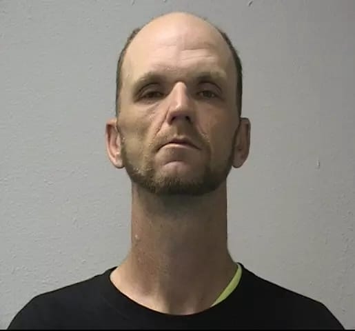 long neck mugshot